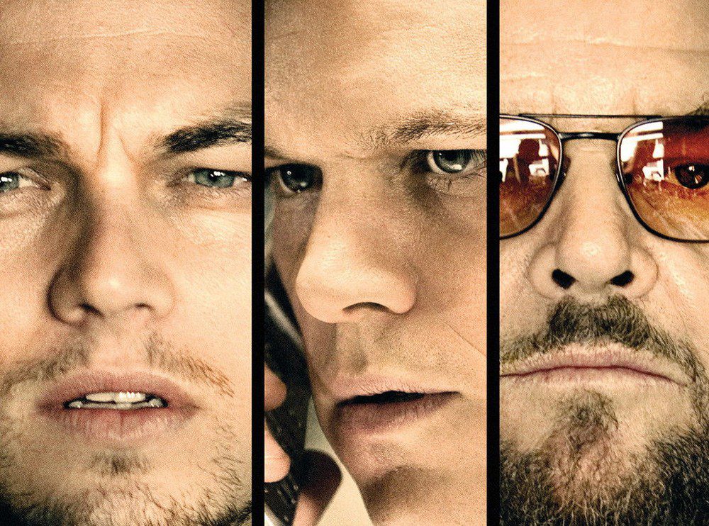 The Departed Movie poster with 3 main actors close up face shots
