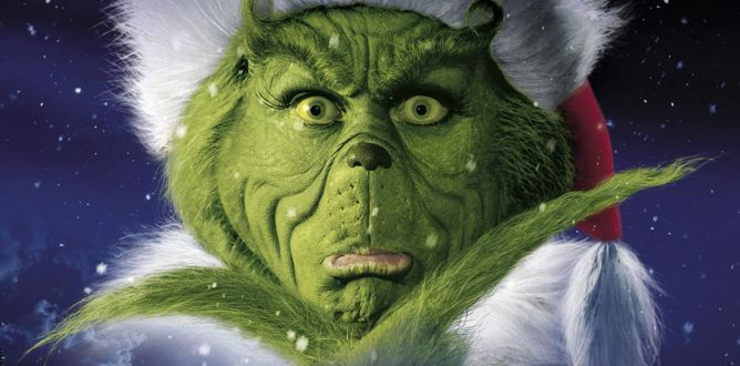 Motorworks Brewing presents The Grinch Movie with the Grinch closeup holding his chin as Fu Manchu