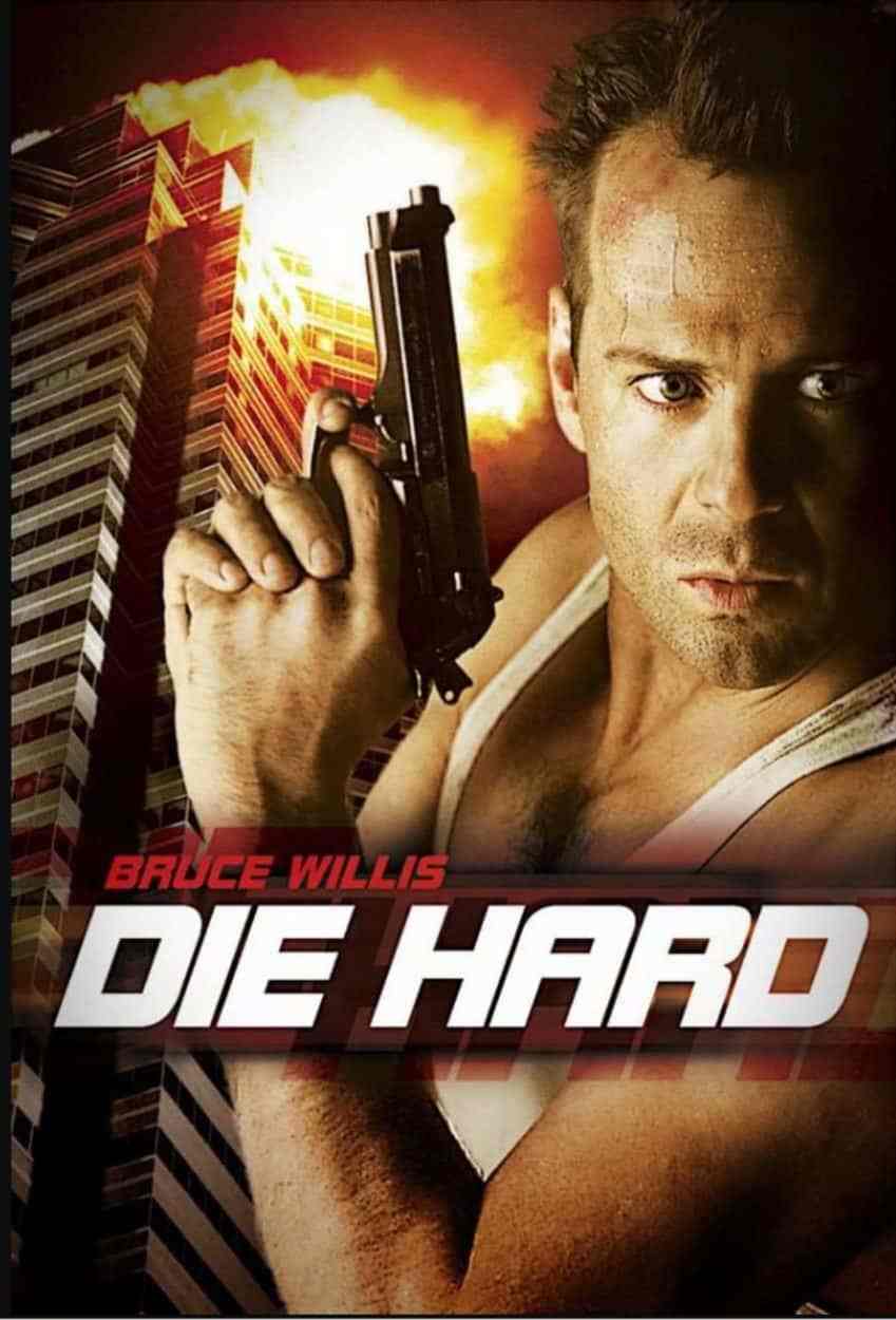 Motorworks Brewing presents Die Hard Movie Poster with Bruce Willis holding gun looking around the corner with skyscraper highest floors exploding