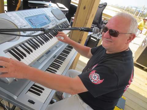 Motorworks Brewing presents Mickey Hardie on Keyboard in performance on outdoor stage